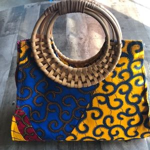 Handmade carryall with rattan handles